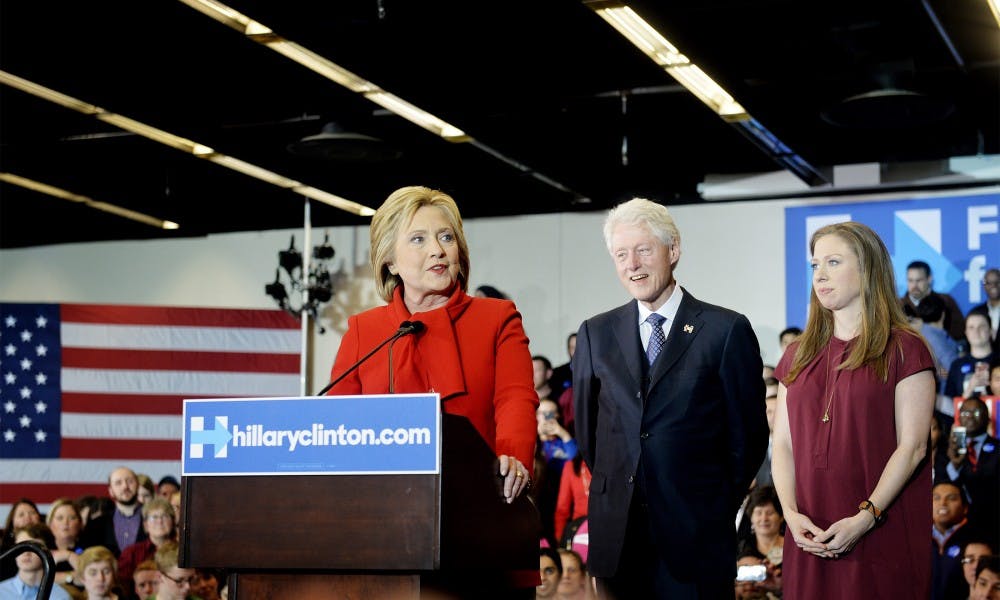 Hillary Clinton speaks with husband Bill Clinton and daughter Chelsea Clinton by her side in Ankeny, Iowa, on Monday, Feb. 1, 2016. Clinton narrowly defeated Sen. Bernie Sanders in Monday&apos;s Democratic Iowa caucus. (AftonbladetIBL/Zuma Press/TNS)