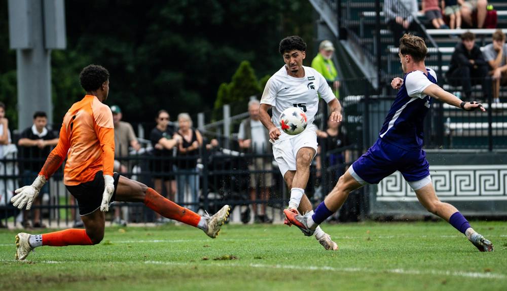 <p>MSU junior forward, Oscar Huerta (15) kicks the ball right between two Niagara players at DeMartin Stadium in East Lansing, Mich., on Sunday, Aug 30, 2026.</p>