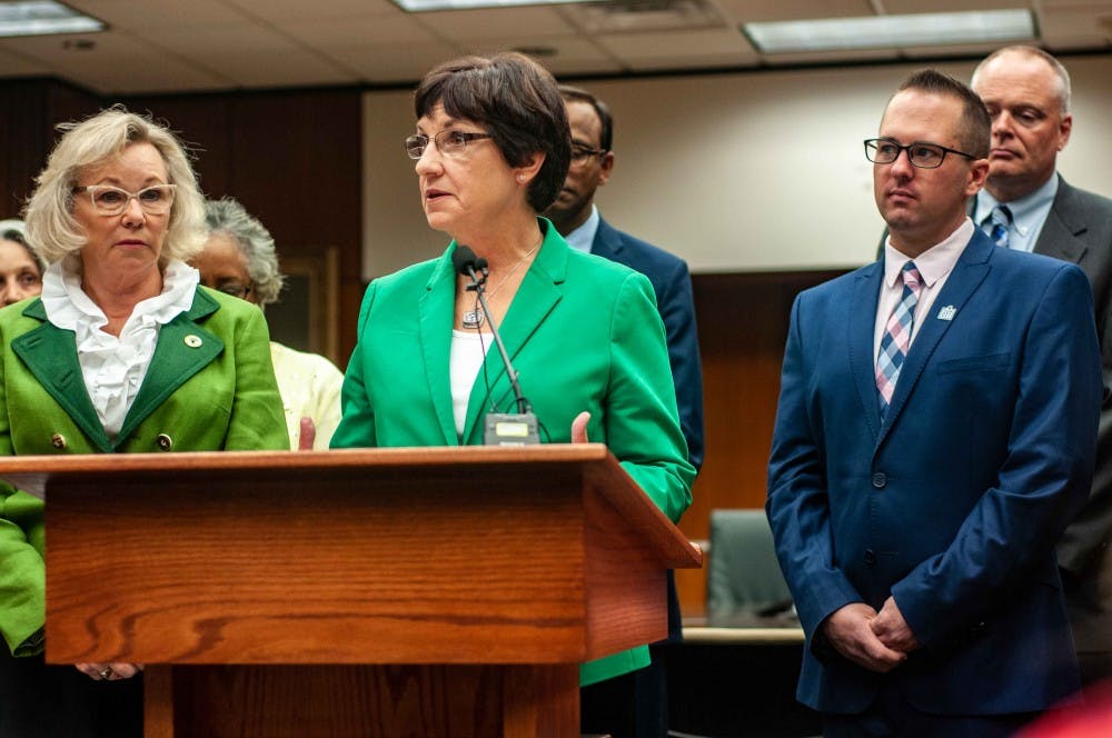 <p>Board of Trustees member Dianne Byrum, right, and Board of Trustees member Melanie Foster, left, speak at the meeting on the update of the presidential search process at the Hannah Administration Building on Aug. 22, 2018.</p>