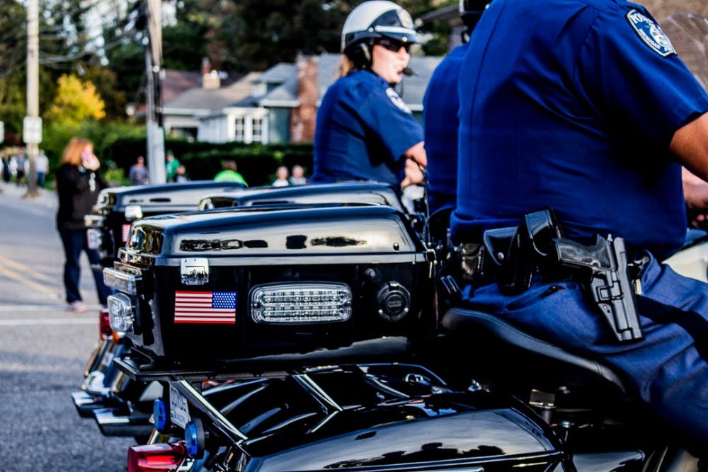 Police line up on their motorcycles during the Homecoming Parade on Oct. 20, 2017 along Abbot Road. 