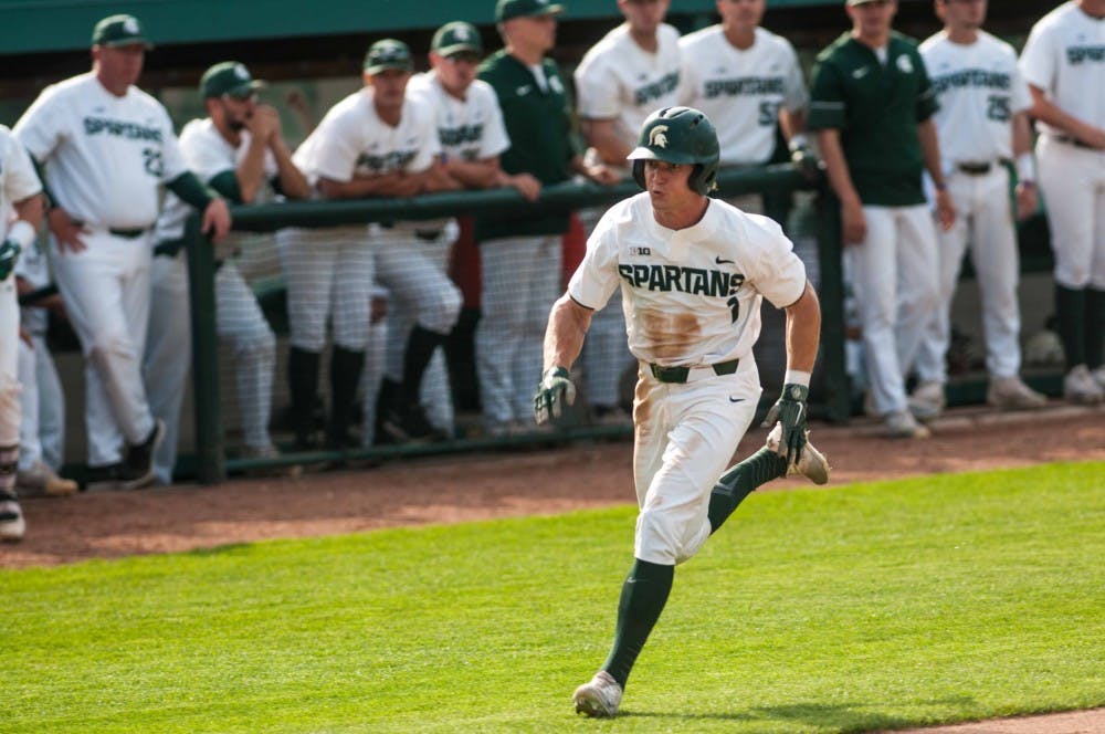 <p>Sophomore outfielder Danny Gleaves (1) runs for home during the game against Ohio State on May 17, 2018 at McLane Baseball Stadium. The Buckeyes defeated the Spartans, 10-8. &nbsp;(Annie Barker | State News)</p>