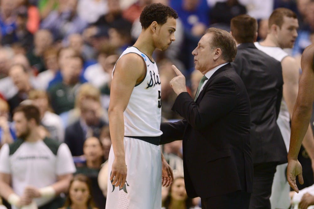 Senior guard Bryn Forbes talks to head coach Tom Izzo during the game against Middle Tennessee State University on March 18, 2016 at Scottrade Center in St. Louis, Mo. The Spartans were defeated by the Raiders, 90-81.