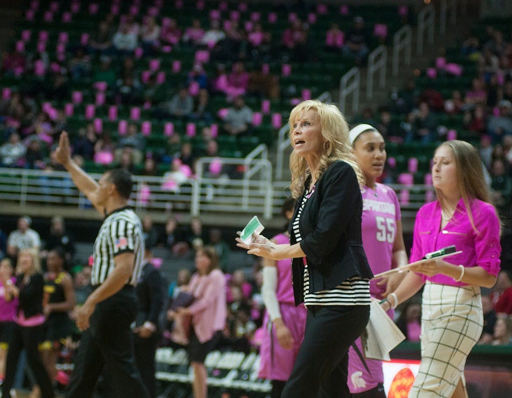 <p>Head coach Suzy Merchant calls over to a referee Feb. 16, 2015, during the Play4Kay Breast Cancer Awareness game against Maryland at Breslin Center. The Spartans were defeated by the Terrapins, 75-69. Hannah Levy/The State News</p>