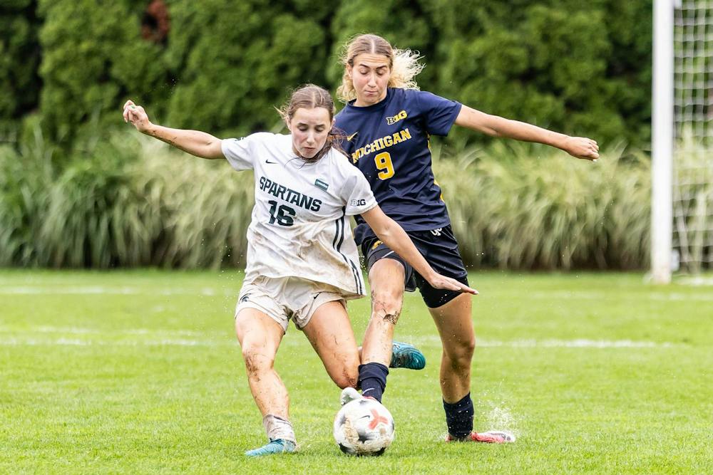 <p>Michigan freshman forward Melisa Kekic (9) fouls Michigan State junior midfielder Kaleigh McPherson (16), resulting in a red card and an end to her game at DeMartin Stadium, with the Wolverines up 3-1 on the Spartans late in the second half in East Lansing, Mich., on Sept. 20, 2026.</p>