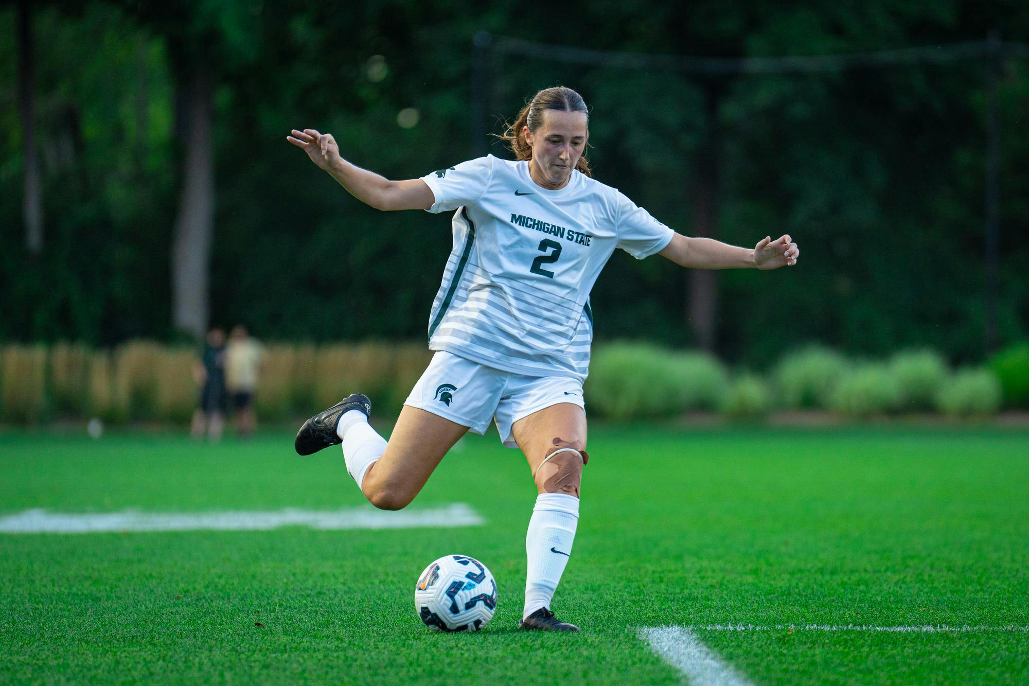 <p>Junior defender Sofia Beerworth (2) tries to kick a goal during an MSU Women's Soccer match against the Ole Miss Rebels at DeMartin Stadium on August 29, 2024.</p>