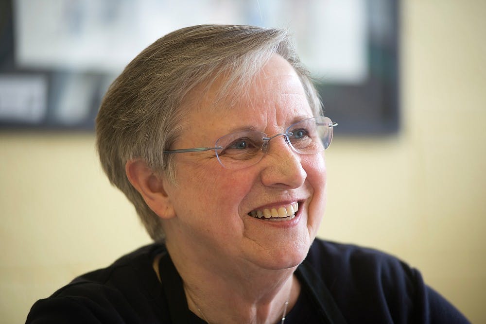 <p>Watercolor artist and instructor Barb Stevens laughs during her intermediate watercolor class April 16, 2014, at Art Unlimited, 4692 Okemos Road in Okemos. Stevens has painted watercolors for over 15 years. Julia Nagy/The State News</p>