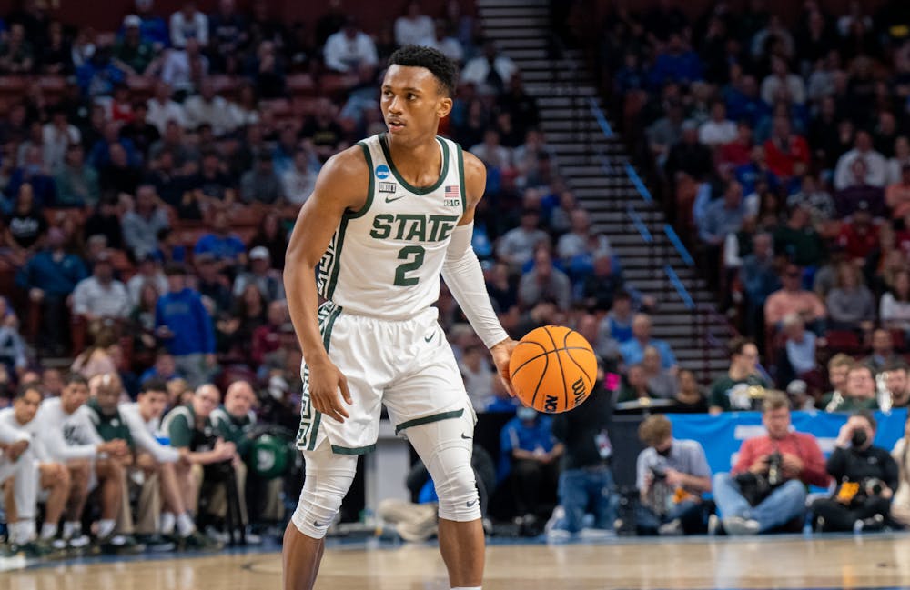 <p>Junior guard Tyson Walker (2) dribbles the ball during Michigan State&#x27;s win over the Davidson Wildcats on March 18, 2022.</p>