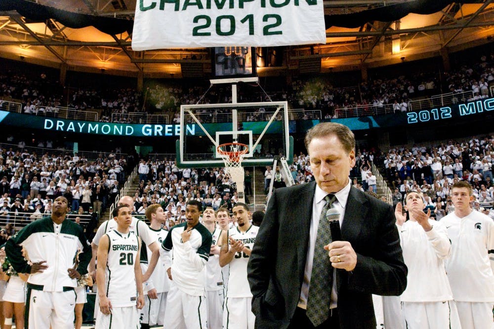 Head coach Tom Izzo addresses the crowd after raising the Big Ten Champion banner Sunday evening at Breslin Center. The Spartans share the title with Ohio State and Michigan. Matt Hallowell/The State News