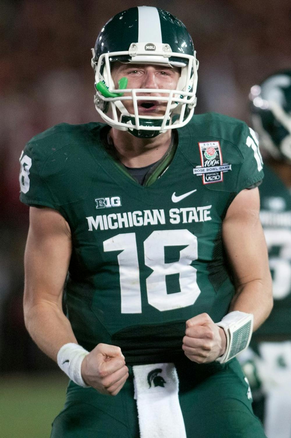 	<p>Sophomore quarterback Connor Cook cheers at the end of the 100th Rose Bowl game against Stanford on Jan. 1, 2014, in Pasadena, Calif. The Spartans defeated the Cardinal, 24-20. Julia Nagy/The State News</p>