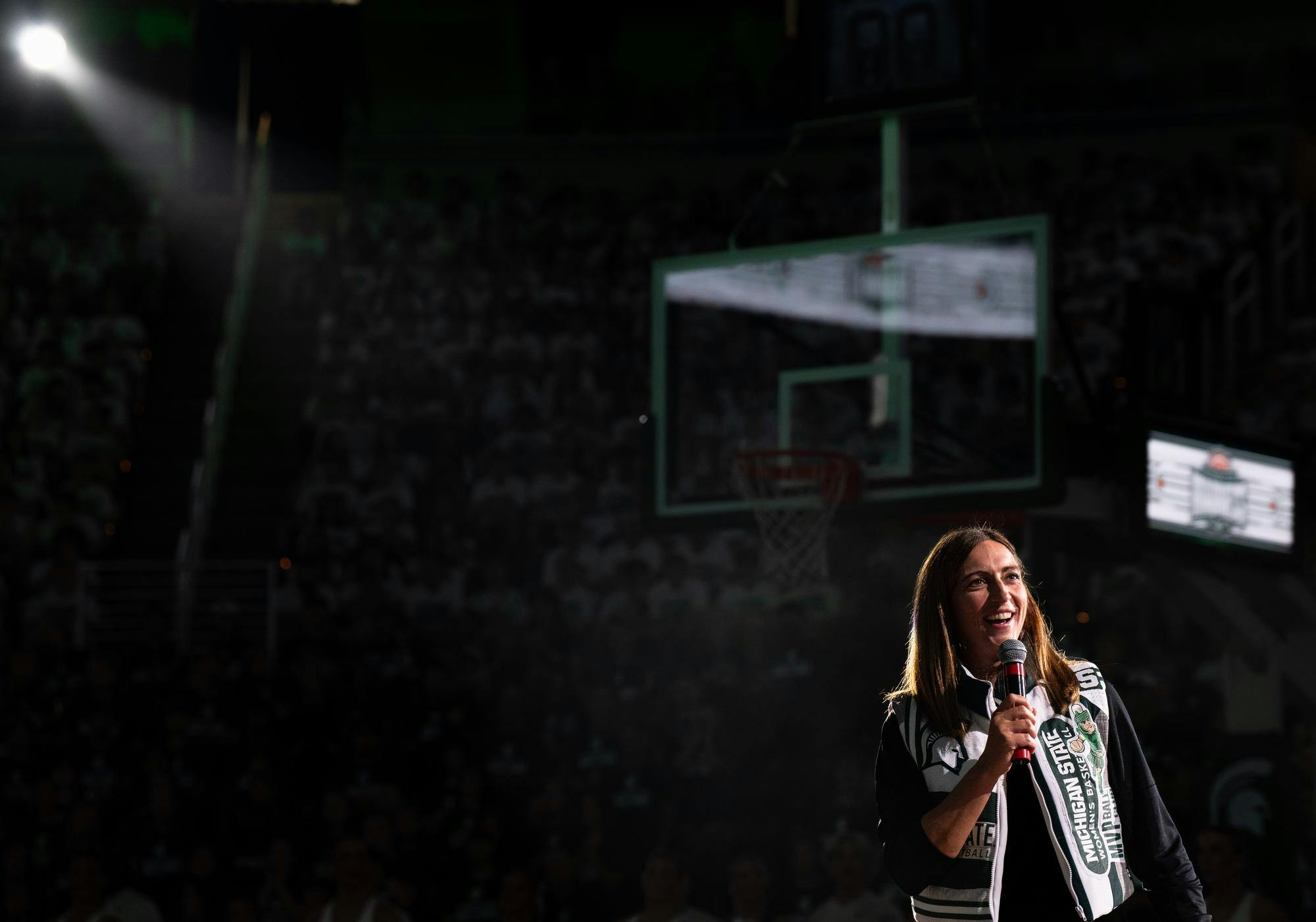 MSU's Womens Basketball Head Coach, Robyn Fralick, speaks to fans during the Midnight Madness event as a part of the Izzone campout festivities at the Breslin Student Event Center on Friday, October 3, 2025. 