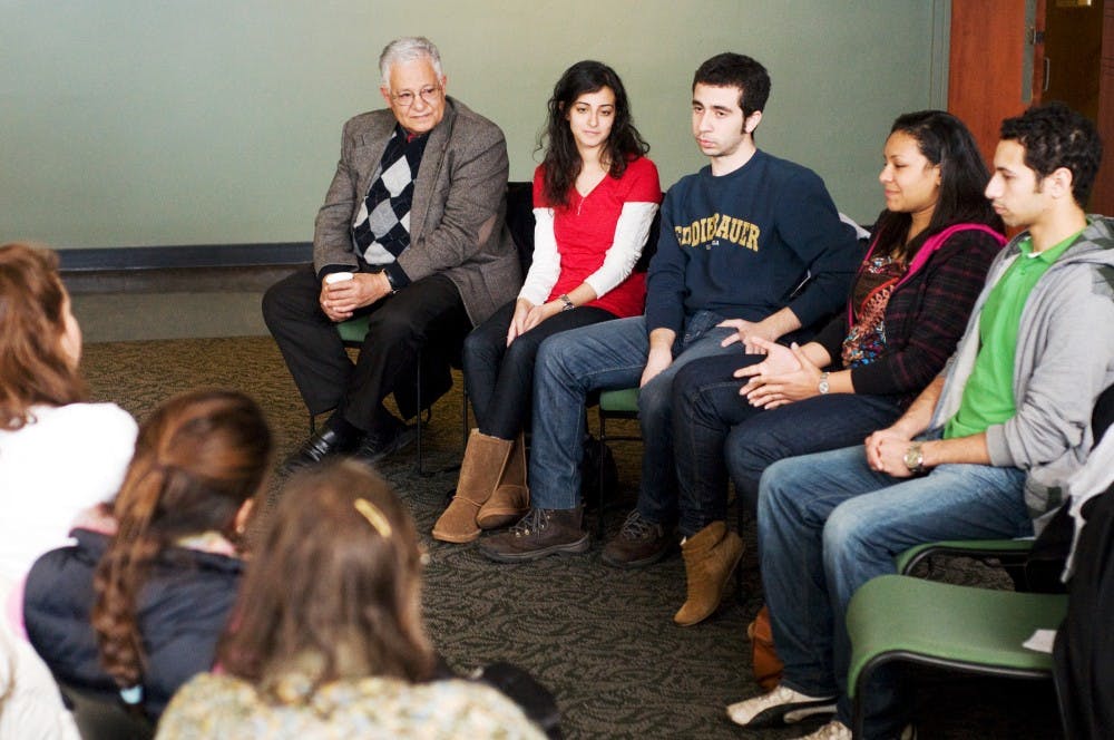 Four Egyptian exchange students from the University of Chicago, who each took part in the revolution in Tahrir Square in their own way, led a panel discussion Friday in Case Hall. The event, "Egyptian Youth Revolution: Open Dialogue with Tahrir Square", was meant to discuss the revolution and compare this to other revolutions in Egypt's history. Kat Petersen/The State News