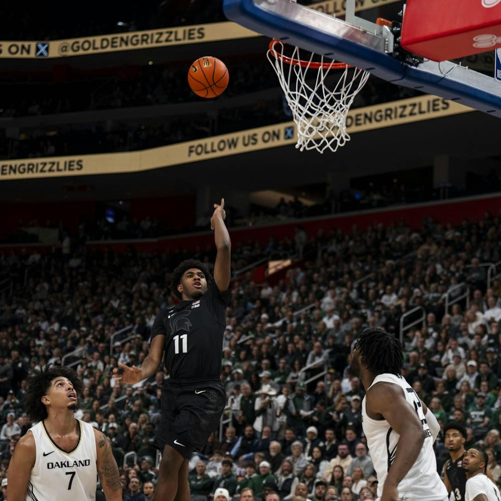 <p>Michigan State freshman guard Jase Richardson (11) shoots the ball at Little Caesars Arena in Detroit on Dec. 17, 2024. The Spartans defeated the Golden Grizzlies 77-58.</p>