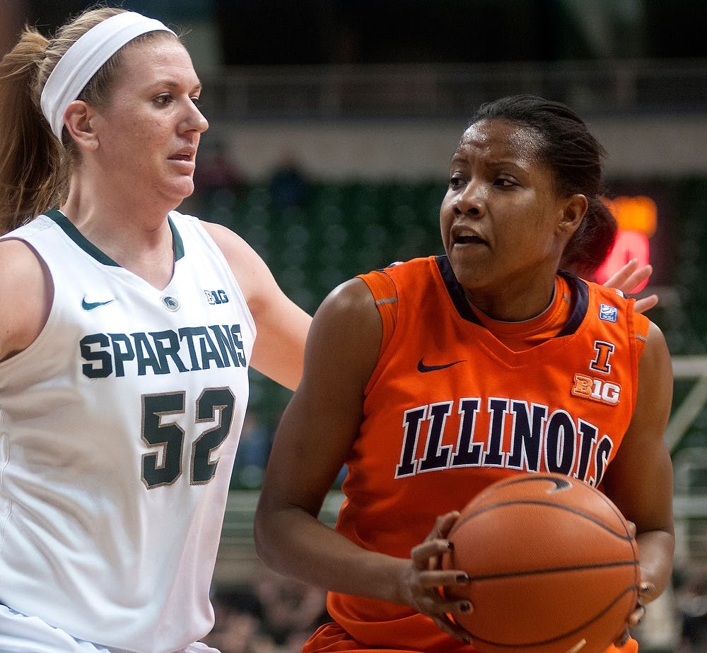 	<p>Junior forward Becca Mills guards Illinois forward Nia Oden on Jan. 23, 2014, at Breslin Center. The Spartans were defeated, 61-51. Betsy Agosta/The State News</p>