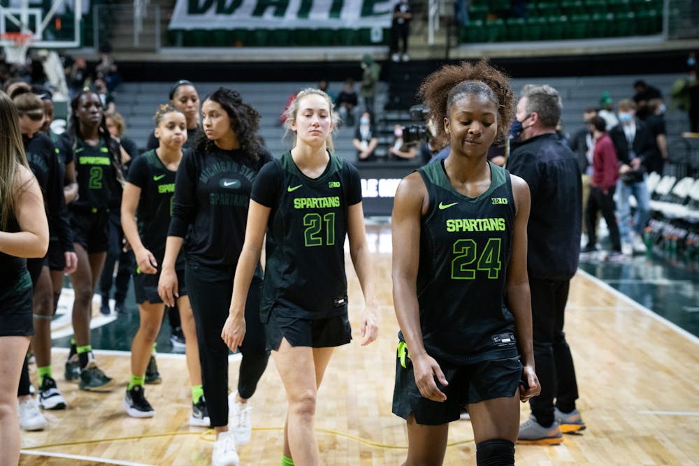 <p>MSU women’s basketball walk off the court after losing to Penn State at the Breslin Center on Feb. 21, 2022. The Spartans lost to the Lady Lions with a score of 79-71. </p>