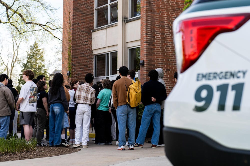 <p>Michigan State University Police respond to the evacuation of Wells Hall due to the presence of unknown chemicals on campus in East Lansing, Mich., on Monday, April 27, 2026.</p>