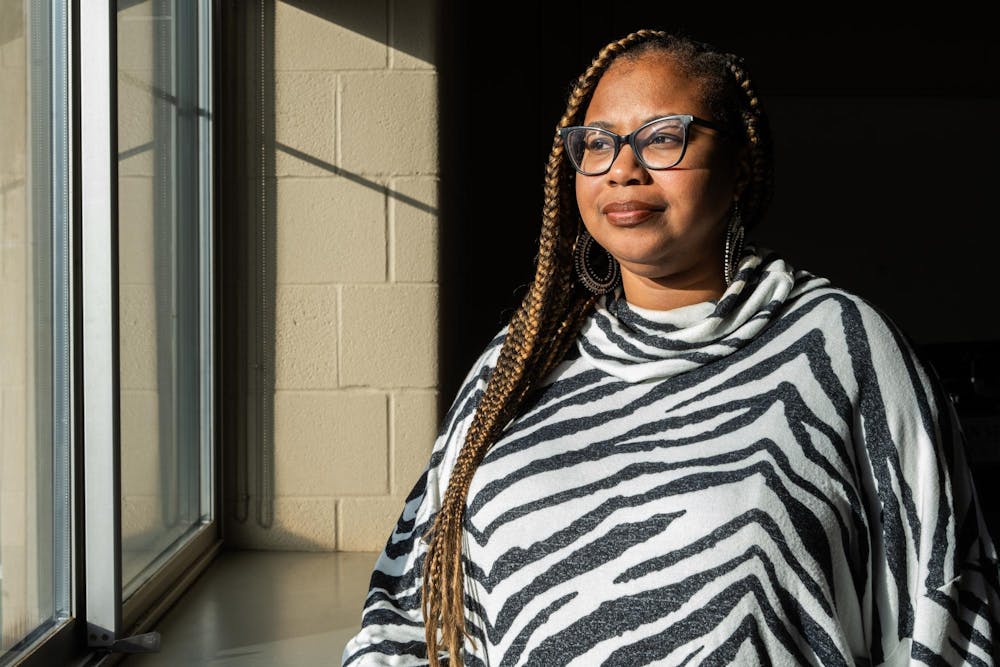 <p>Dr. LeConté Dill poses for a photo in Bessey Hall on Feb. 15, 2024. Dill's play, which is based on a series of dreams she had when she was pregnant, aims to examine the medical world's lack of attention paid to maternal deaths among black women.</p>