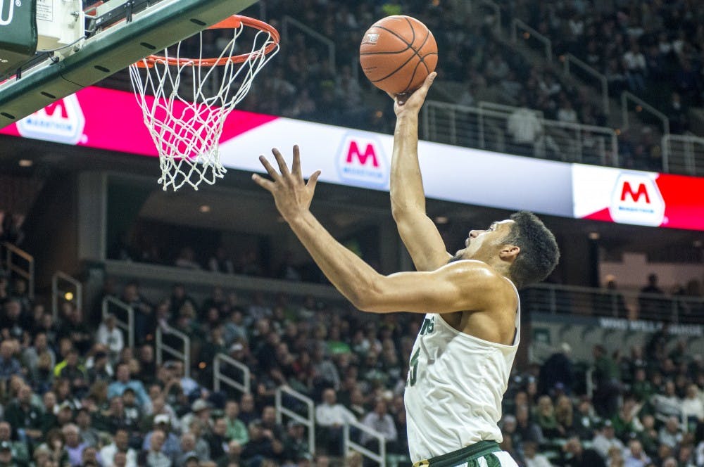 Sophomore forward Kenny Goins (25) goes for a lay up during the second half of the men's basketball game against Rutgers on Jan. 4, 2017 at Breslin Center. The Spartans defeated the Scarlet Knights, 93-65.