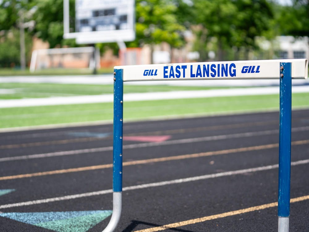 A track barrier outside the football field at East Lansing High School on May 24, 2024.