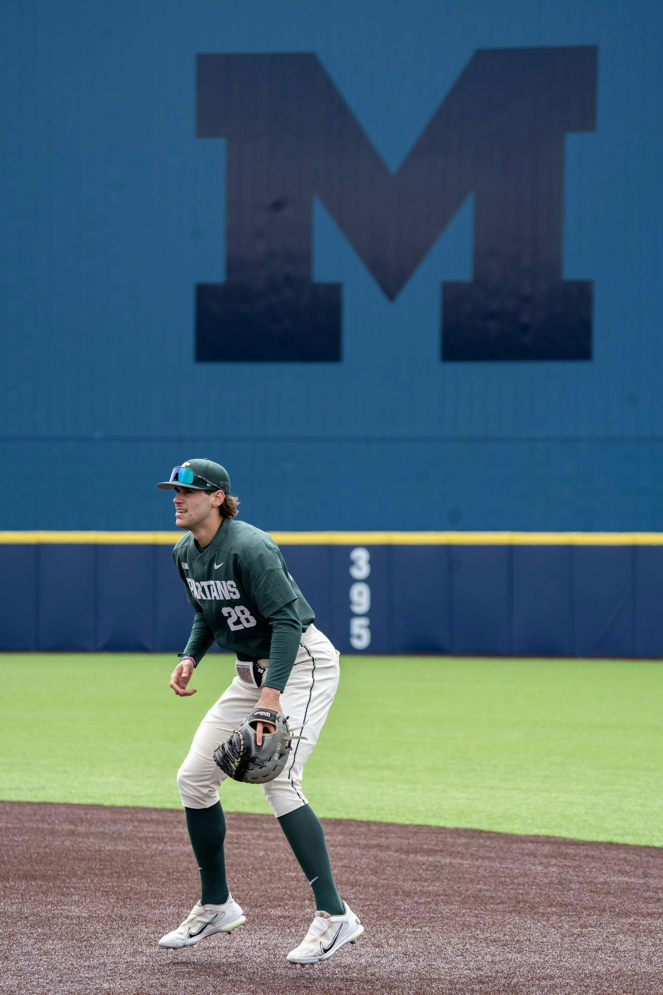 <p>Spartan first baseman Brock Vradenburg crouches at the ready during Michigan State's final game of the series against Michigan.</p>