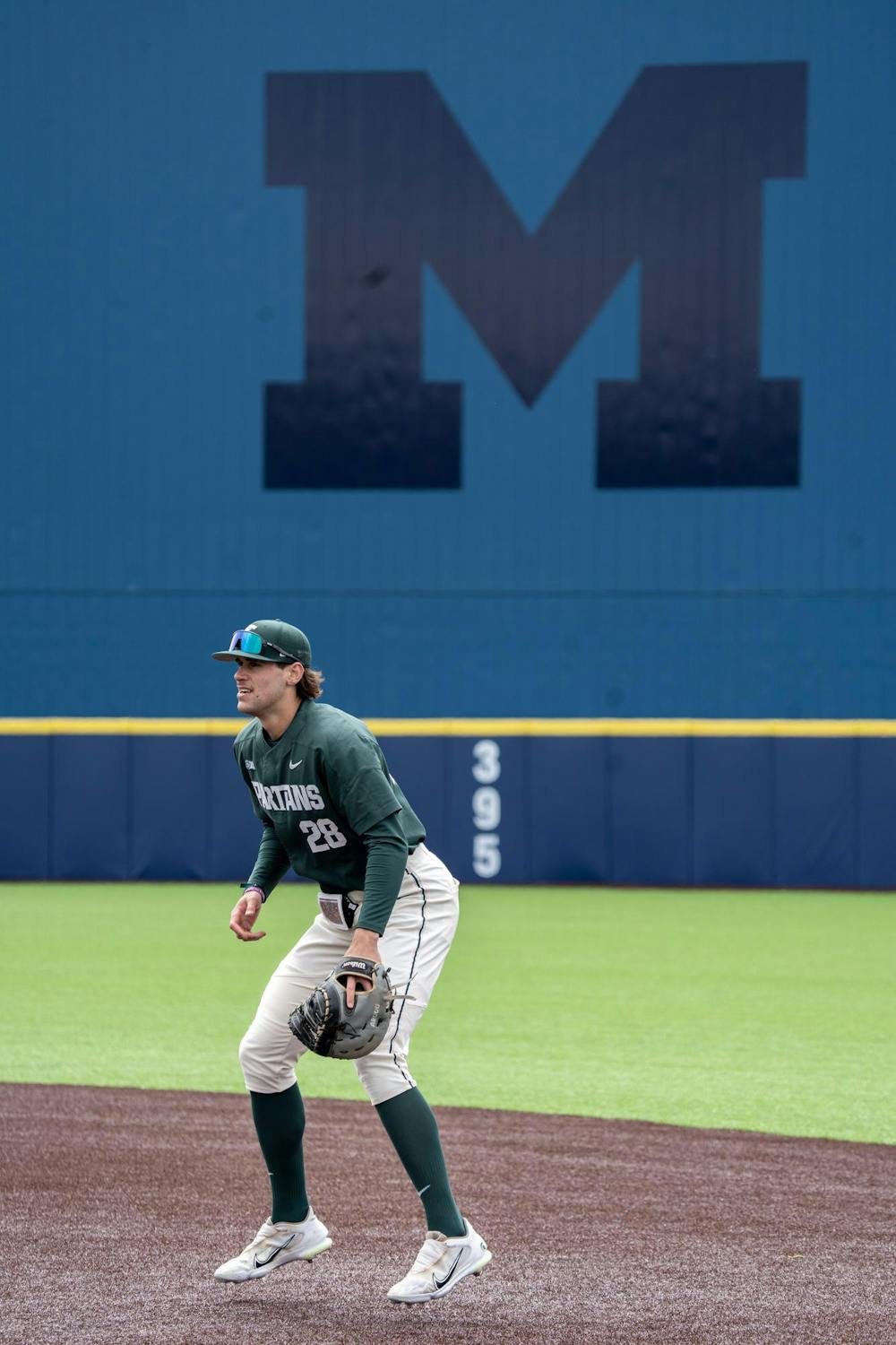 <p>Spartan first baseman Brock Vradenburg crouches at the ready during Michigan State's final game of the series against Michigan.</p>