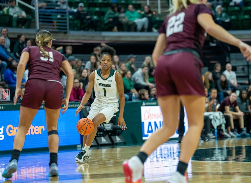 <p>MSU graduate guard Jaddan Simmons (1) drives the ball down the court against Eastern Kentucky at the Breslin Center on Nov. 14, 2024.</p>