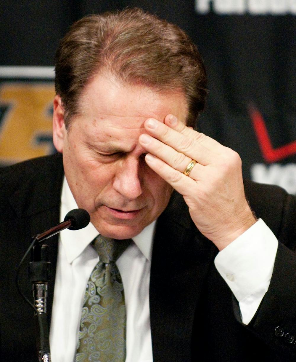 Head coach Tom Izzo pauses while answering questions during the post-game conference on Saturday night at Mackey Arena in West Lafayette, Ind. With the Spartans' 86-76 loss to the Boilermakers, the team is now tied for fourth in the Big Ten race at 4-3 in conference play. Josh Radtke/The State News