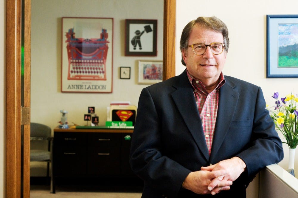 <p>MSU Ombudsman Stan Soffin stands by the door of his office in North Kedzie Hall, an office he has occupied for 13 years. Now, after 43 years of MSU affiliation, Soffin will retire. He will step down from his role as ombudsman on Aug. 15, 2011, and will spend the following year in a consulting role for the Office of the Ombudsman.</p>