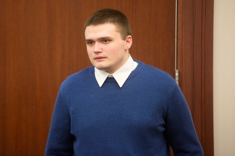	<p>Alleged murderer Connor McCowan walks into the courtroom during his trial Oct. 10, 2013, at the Ingham County Circuit Court in Lansing. McCowan is on trial for open murder after the Feb. 23 killing of <span class="caps">MSU</span> student Andrew Singler. Julia Nagy/The State News</p>