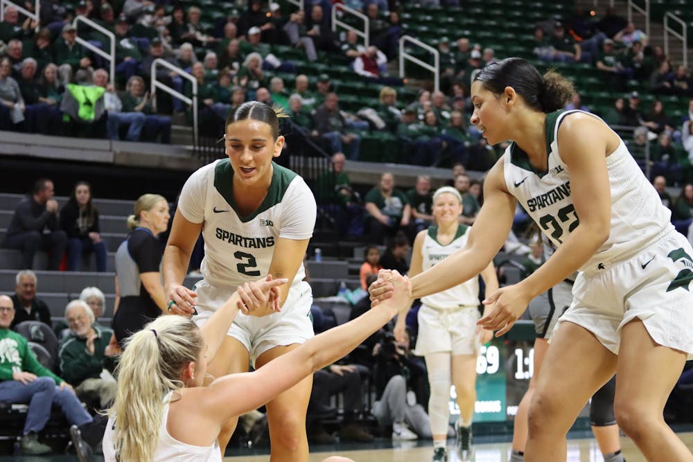 <p>Michigan State Women’s Basketball team takes on Purdue at the Breslin Center in East Lansing on Jan. 24, 2024. The Spartans offer Ozment a helping hand after a foul play.</p>