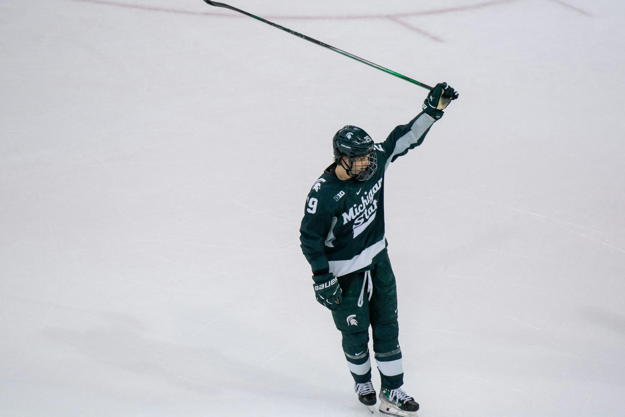 Freshman forward Gavin O'Connell (29) celebrates a scored goal during a game against University of Michigan at Yost Ice Arena on Feb. 9, 2024. O'Connell scored 1 of the 5 Spartan goals as they took down the Wolverines.