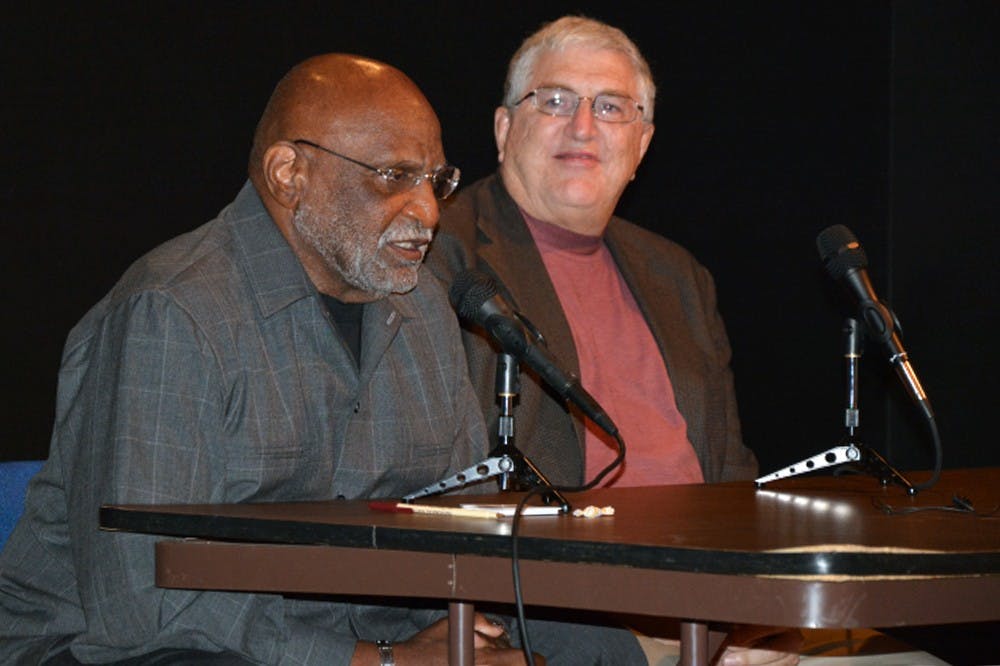 <p>Jimmy Raye and Duffy Daugherty speak at a recent book signing. Photo courtesy of Duffy Daugherty.</p>