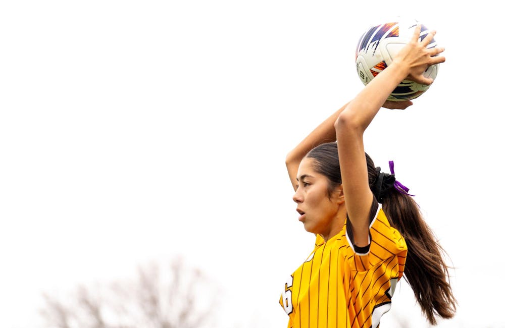 <p>Western Michigan University redshirt junior defender Abby Baldridge (26) looks to throw in the ball during the NCAA soccer tournament game between MSU and WMU on Nov. 16, 2024. The Spartans defeated the Broncos, 3-1.</p>