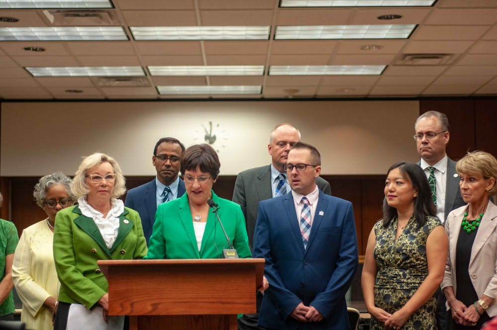 Members of the Presidential Search Committee gather with members of the Board of Trustees at the meeting on the update of the presidential search process at the Hannah Administration Building on Aug. 22, 2018.