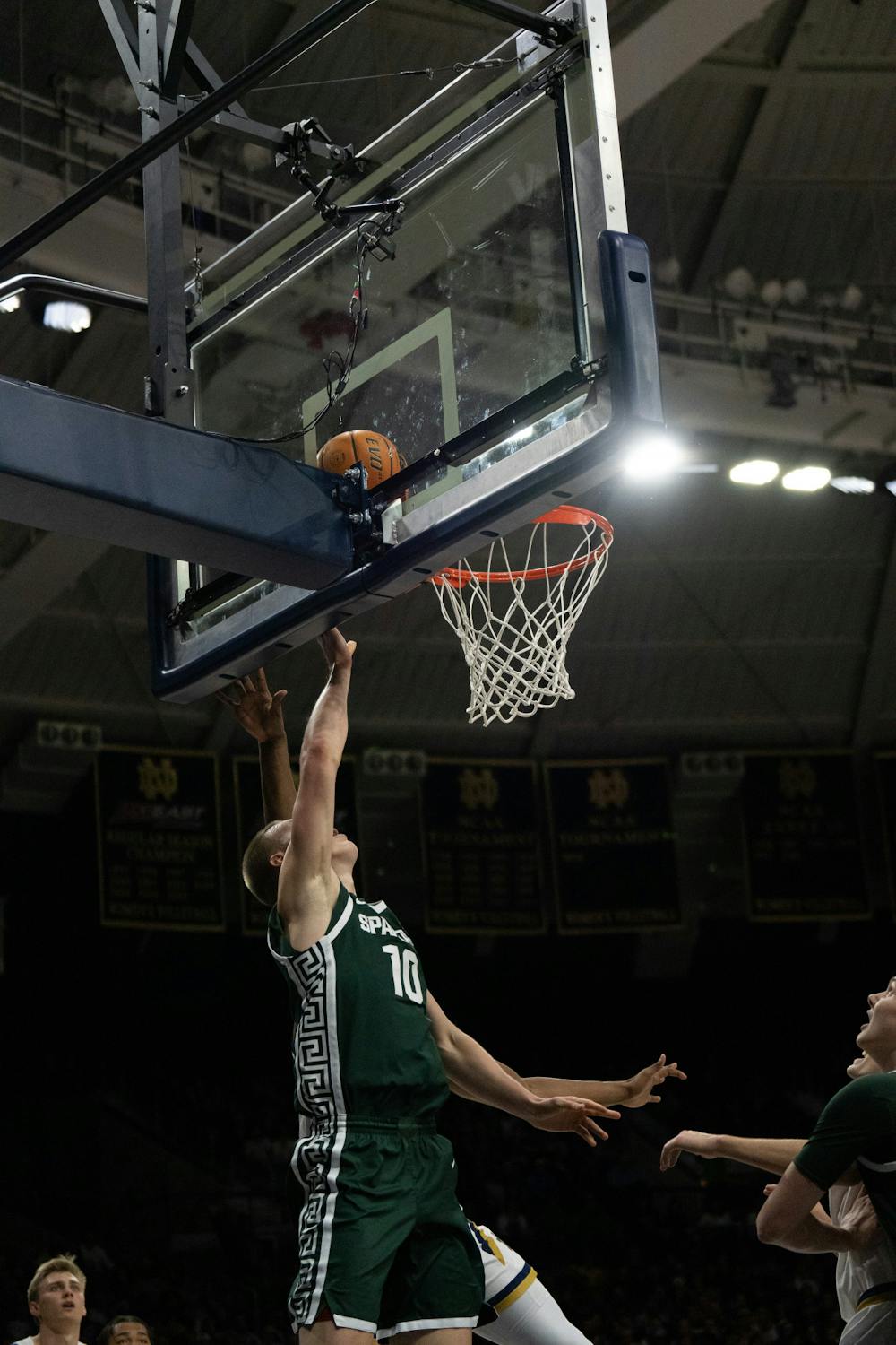 <p>Graduate forward Joey Hauser attempting a layup during the Notre Dame v. MSU game held at the Joyce Center on November 30, 2022. The Spartans lost to the Fighting Irish 52 -70.</p>