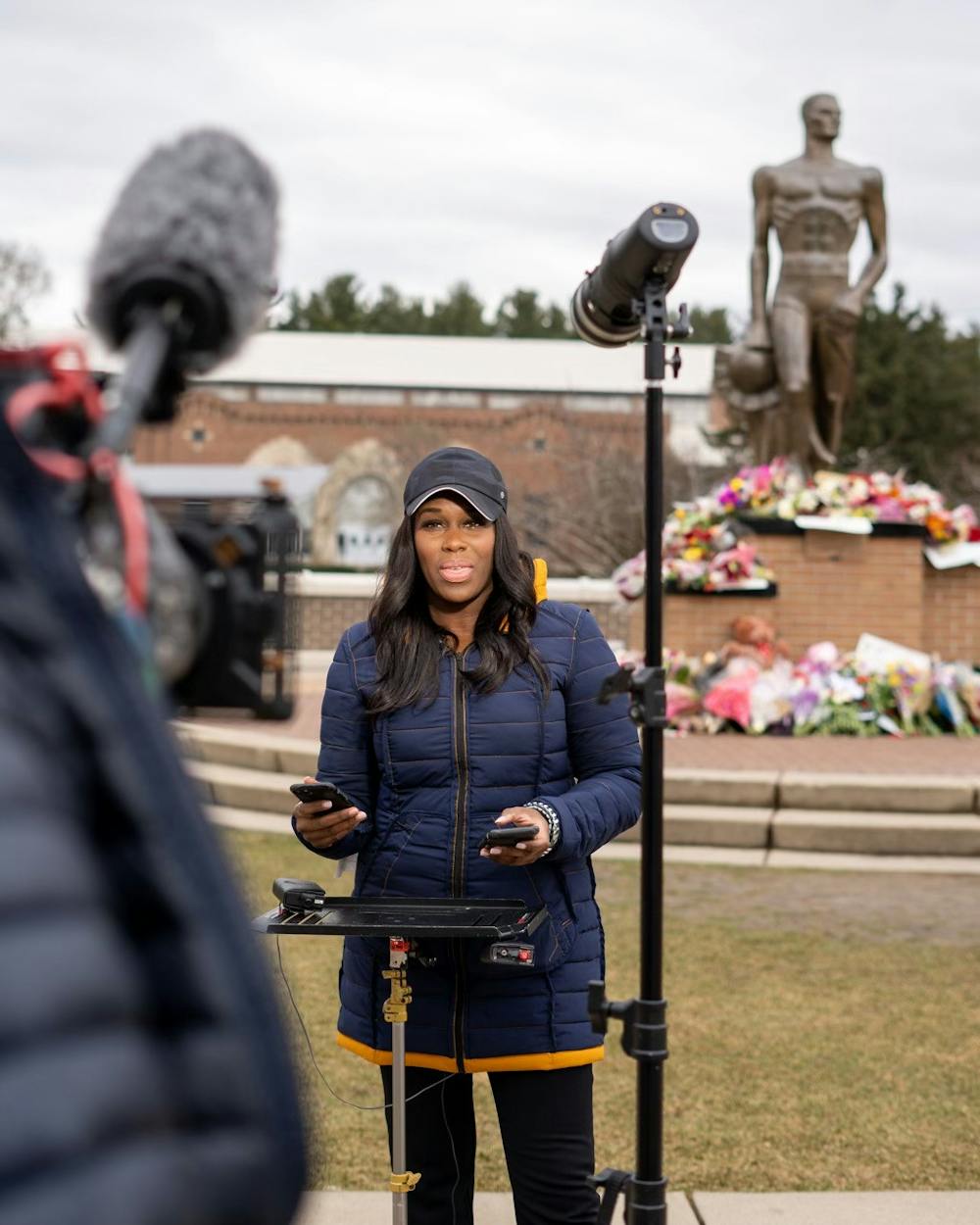 MSU alumna and CNN correspondant Adrienne Broaddus interviews after Michigan State's mass shooting. Courtesy of Eric Olanowski/Olo Media