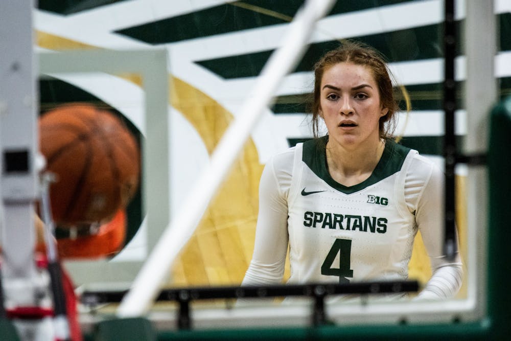 <p>Senior guard Taryn McCutcheon (4) watches a teammate shoot a free throw during the game against Northwestern Jan. 23, 2020 at the Breslin Center. The Spartans fell to the Wildcats, 76-48.</p>