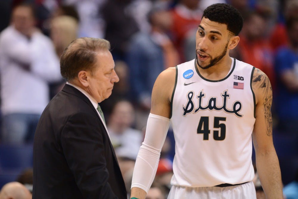 Head coach Tom Izzo talks to senior guard Denzel Valentine during the game against Middle Tennessee State University on March 18, 2016 at Scottrade Center in St. Louis, Mo. The Spartans were defeated by the Raiders, 90-81.