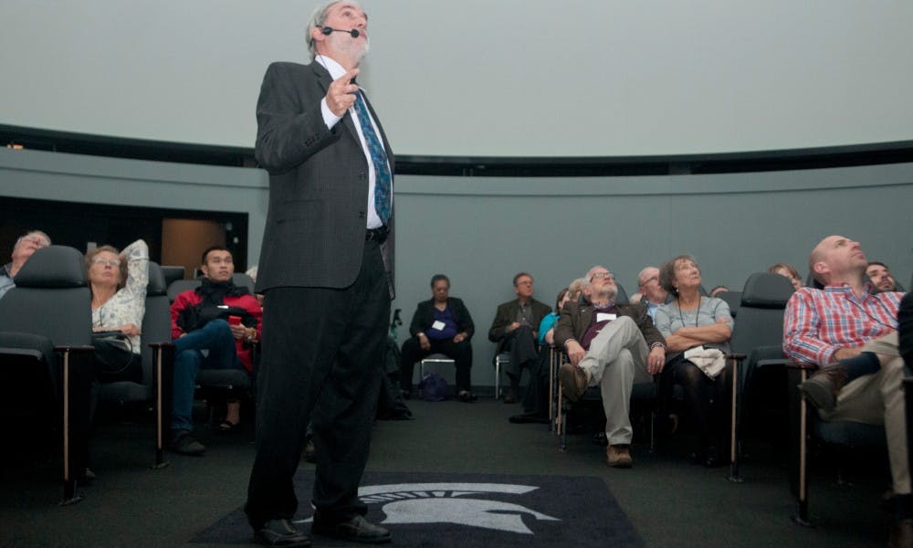 <p>Harvard University professor Daniel Nocera speaks to the crowd on Oct. 25, 2015 inside the Abrams Planetarium. </p>