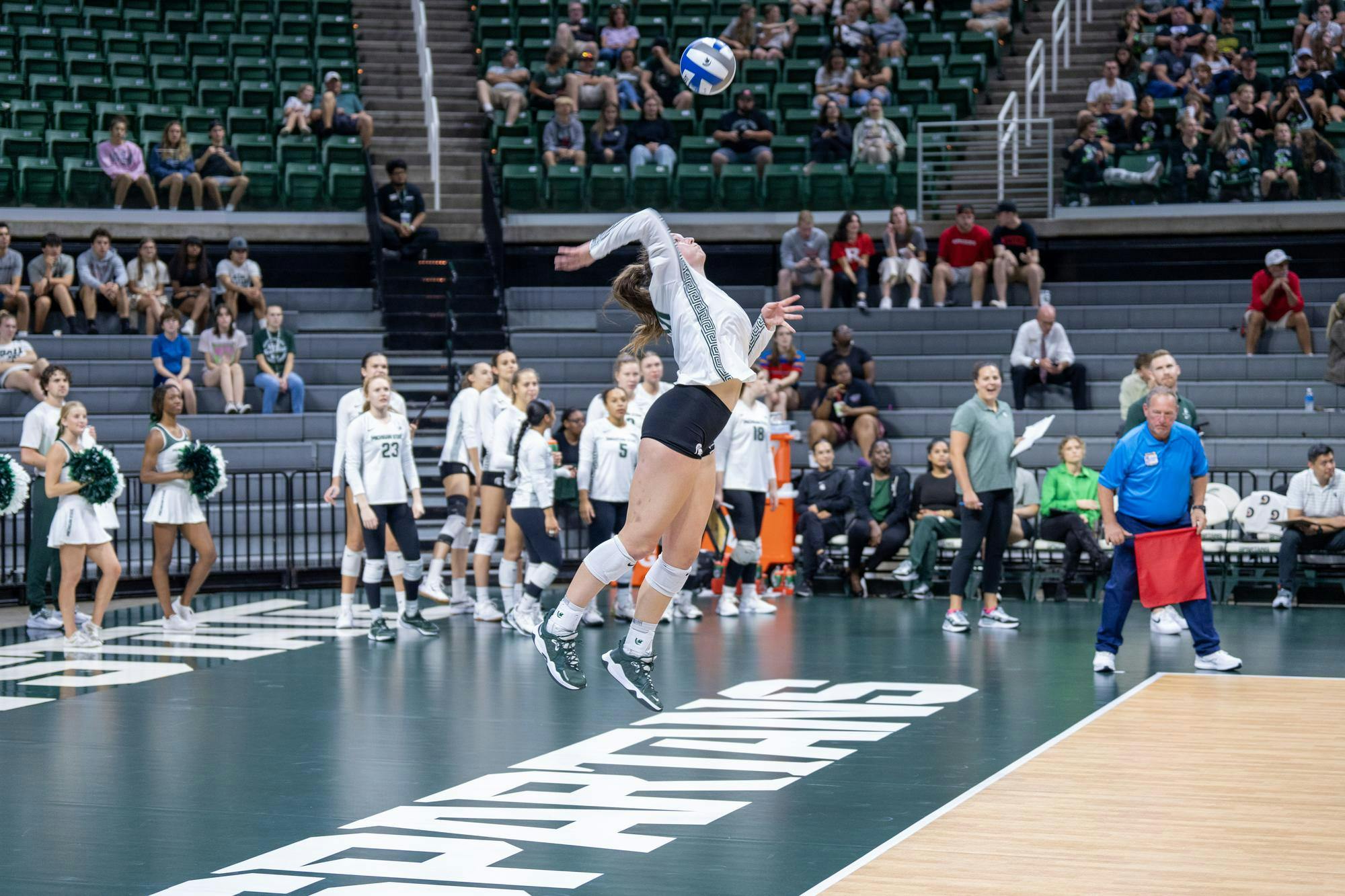 <p>Michigan State Fr. Taylah Holdem serves against Rutgers during their game on Oct. 1, 2023, at the Jack Breslin Student Events Center. Holdems' Spartans defeated the Rutgers Scarlet Knights in Four Sets.</p>