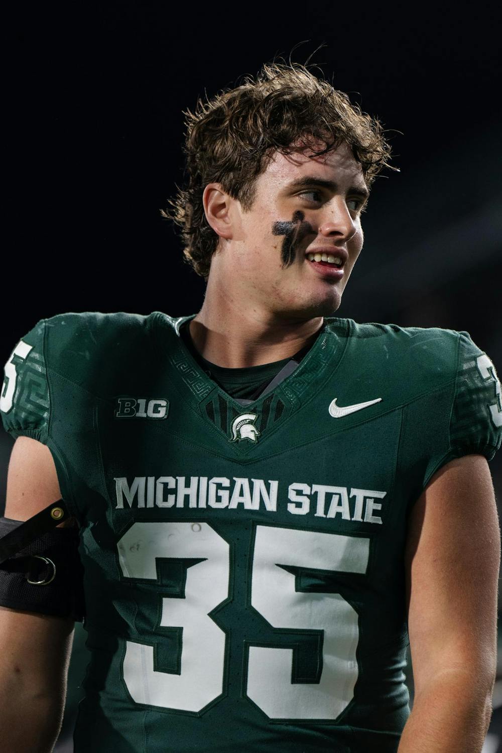 Michigan State redshirt senior line backer Sam Edwards (35) smiles after the Spartans take a 32-20 victory against the University of Iowa at Spartan Stadium on Oct. 19, 2024. 
