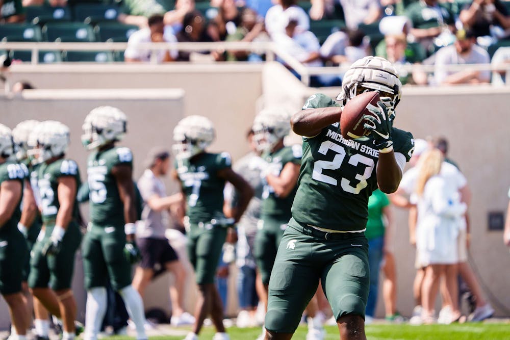 <p>Sixth-year tight end Tyneil Hopper (23) running a drill during the MSU football spring open practice, hosted at Spartan Stadium on April 15, 2023.</p>