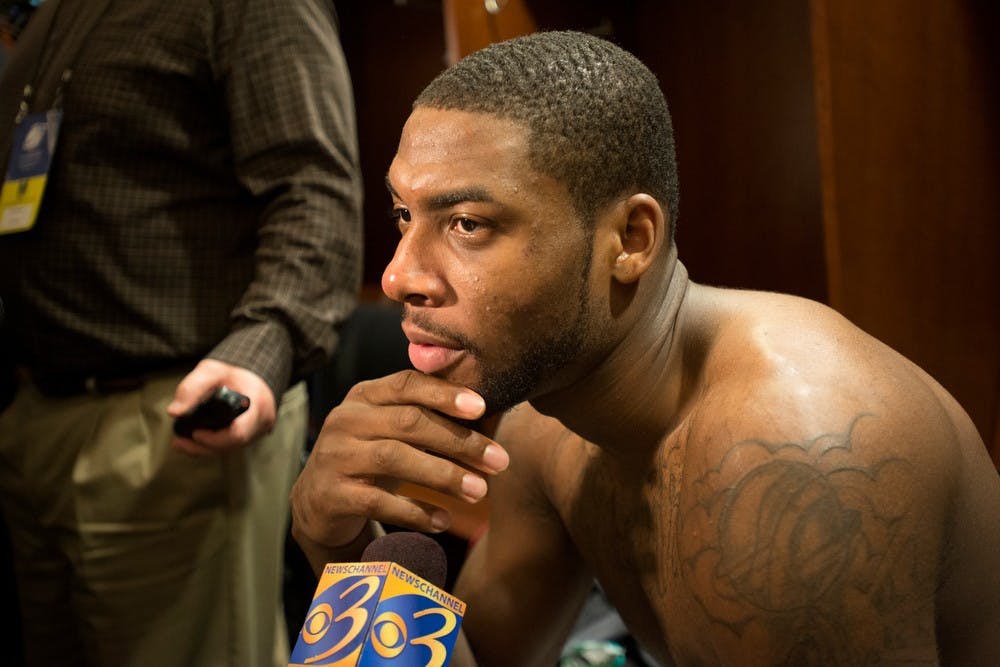 <p>Junior guard/forward Branden Dawson talks to the media after the game against Connecticut on March 30, 2014, at Madison Square Garden in New York City. The Spartans lost in the Elite Eight, 60-54. Julia Nagy/The State News</p>