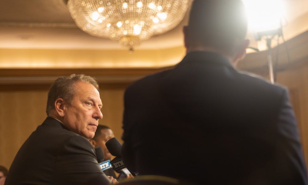 <p>Head basketball coach Tom Izzo (left) is interviewed during Big Ten basketball media day on Oct. 2, 2019 in Chicago. </p>