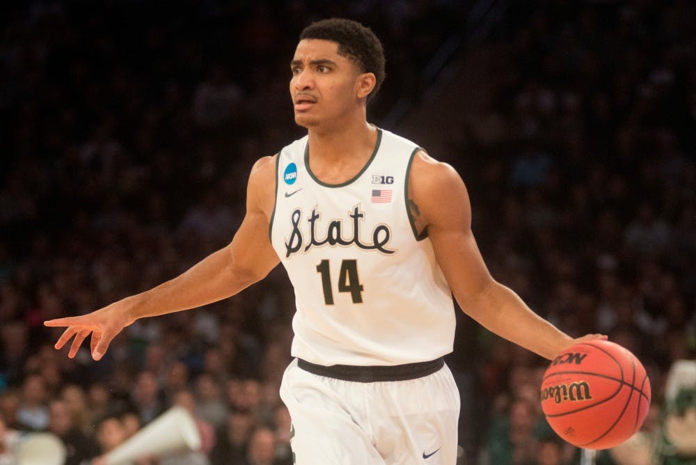 <p>Sophomore guard Gary Harris talks to his teammates during the game against Connecticut on March 30, 2014, at Madison Square Garden in New York City. The Spartans lost in the Elite Eight, 60-54. Julia Nagy/The State News</p>