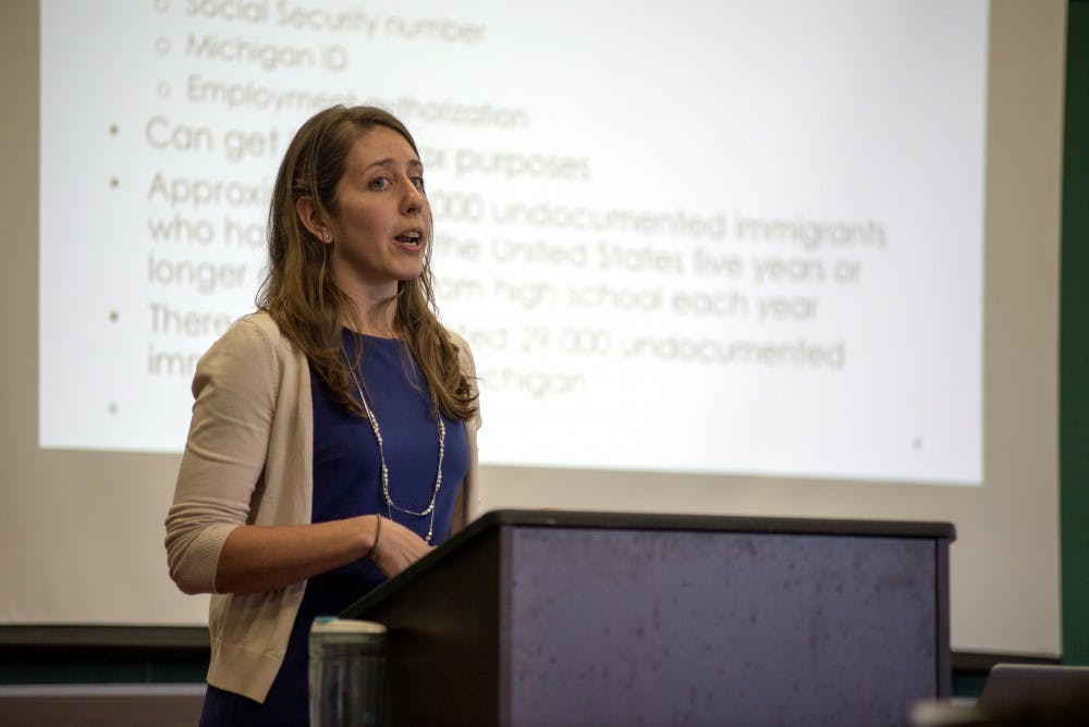 <p>Michigan Immigrant Rights attorney Anna Hill speaks to student and community members about immigration and education laws on April 18, 2016 at Wonders Hall.</p>