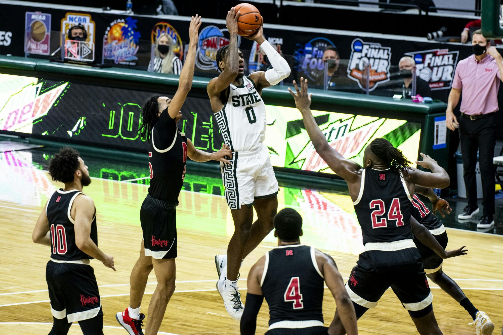 <p>Forward Aaron Henry (0) makes a shot during the game against Nebraska on Feb. 6, 2021, at the Breslin Center. The Spartans defeated the Cornhuskers, 66-56.</p>
