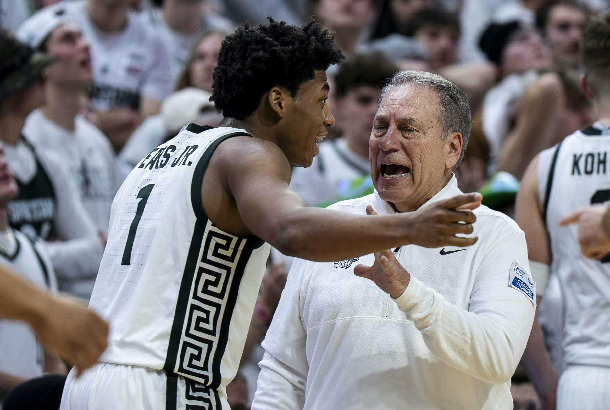 MSU head men’s basketball coach Tom Izzo talks to MSU redshirt sophomore guard Jeremy Fears Jr. (1) between points at the Breslin Student Events Center on Jan. 30, 2026. 