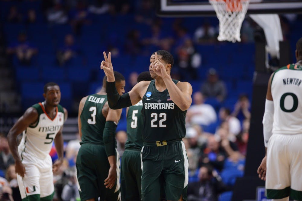 Freshman forward Miles Bridges (22) motions to his teammates during the second half of the game against University of Miami (Fla.) in the first round of the Men's NCAA Tournament on March 17, 2017 at  at the BOK Center in Tulsa, Okla.The Spartans defeated  the Hurricanes, 78-58.
