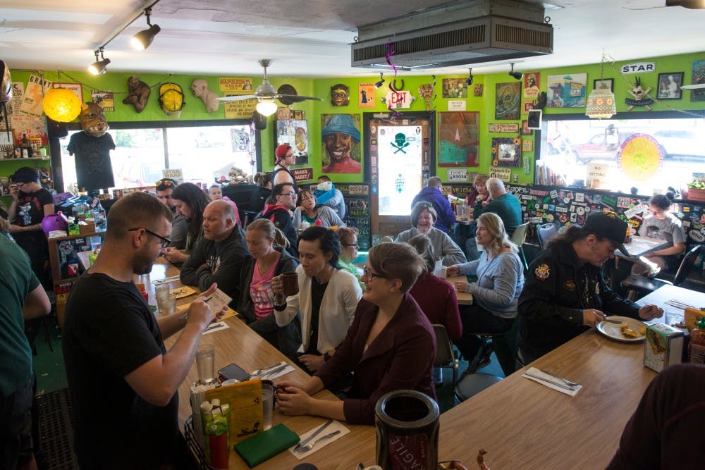 Customers enjoy themselves on June 8, 2016 at Golden Harvest at 1625 Turner St. in Lansing, Mich.