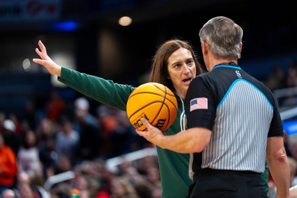 MSU HC, Robyn Fralick, gets in the referees face while talking to them in the Gainbridge Fieldhouse in Indianapolis, IN on March 5, 2026.